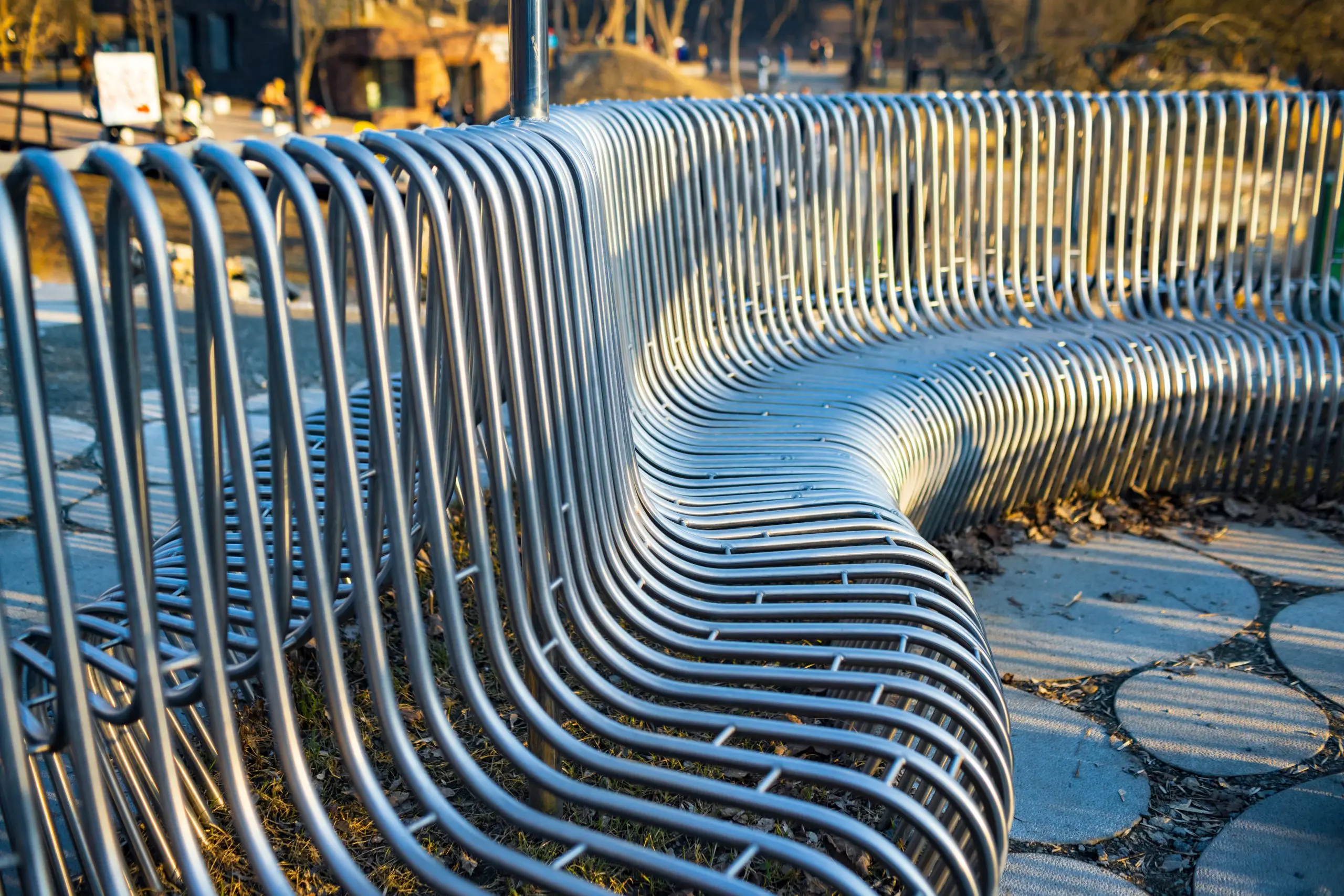Close-up street bench metal pipes arranged parallel Professional plane expluatation service in big hangar